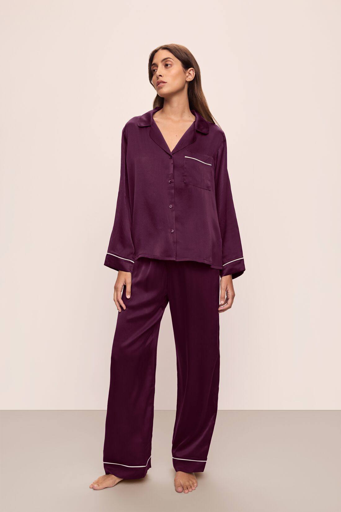 Model wears Inez Washable Silk Long PJ Set in Plum/Ivory.