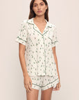 Model wears the Gisele Printed TENCEL™ Modal Relaxed Short PJ Set in Alpine Skier Ivory/Forest Green.