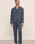 Model wears Charles Washable Silk Printed Long PJ Set in Classic Stripe Navy/Ivory.