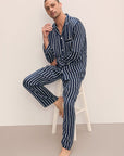 Model wears Charles Washable Silk Printed Long PJ Set in Classic Stripe Navy/Ivory.