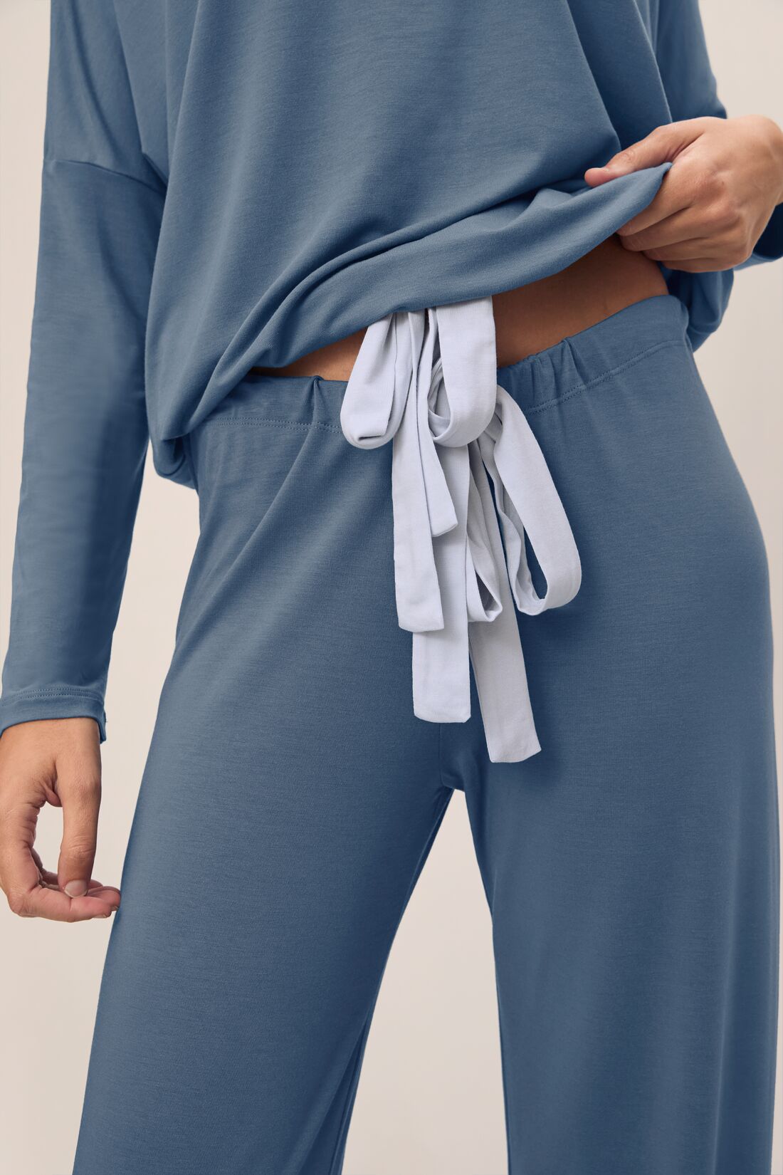 Model wears Gisele TENCEL™ Modal Slouchy PJ Set in Coastal Blue/Ice Blue.