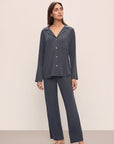 Model wears Gisele TENCEL™ Modal Rib Long PJ Set in Graphite.