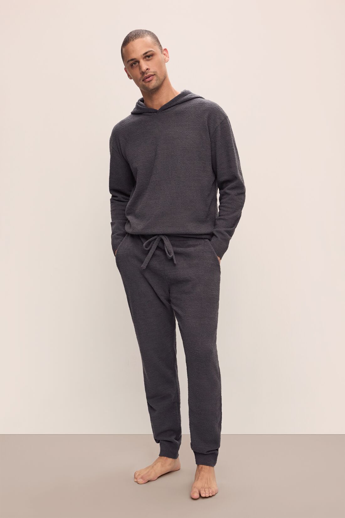 Model wears Men&#39;s Recycled Boucle Jogger in Graphite.