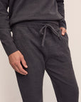 Model wears Men's Recycled Boucle Jogger in Graphite.