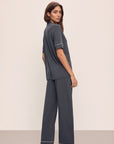 Model wears Gisele TENCEL™ Modal Short Sleeve & Pant PJ Set in Graphite/Sorbet Pink.