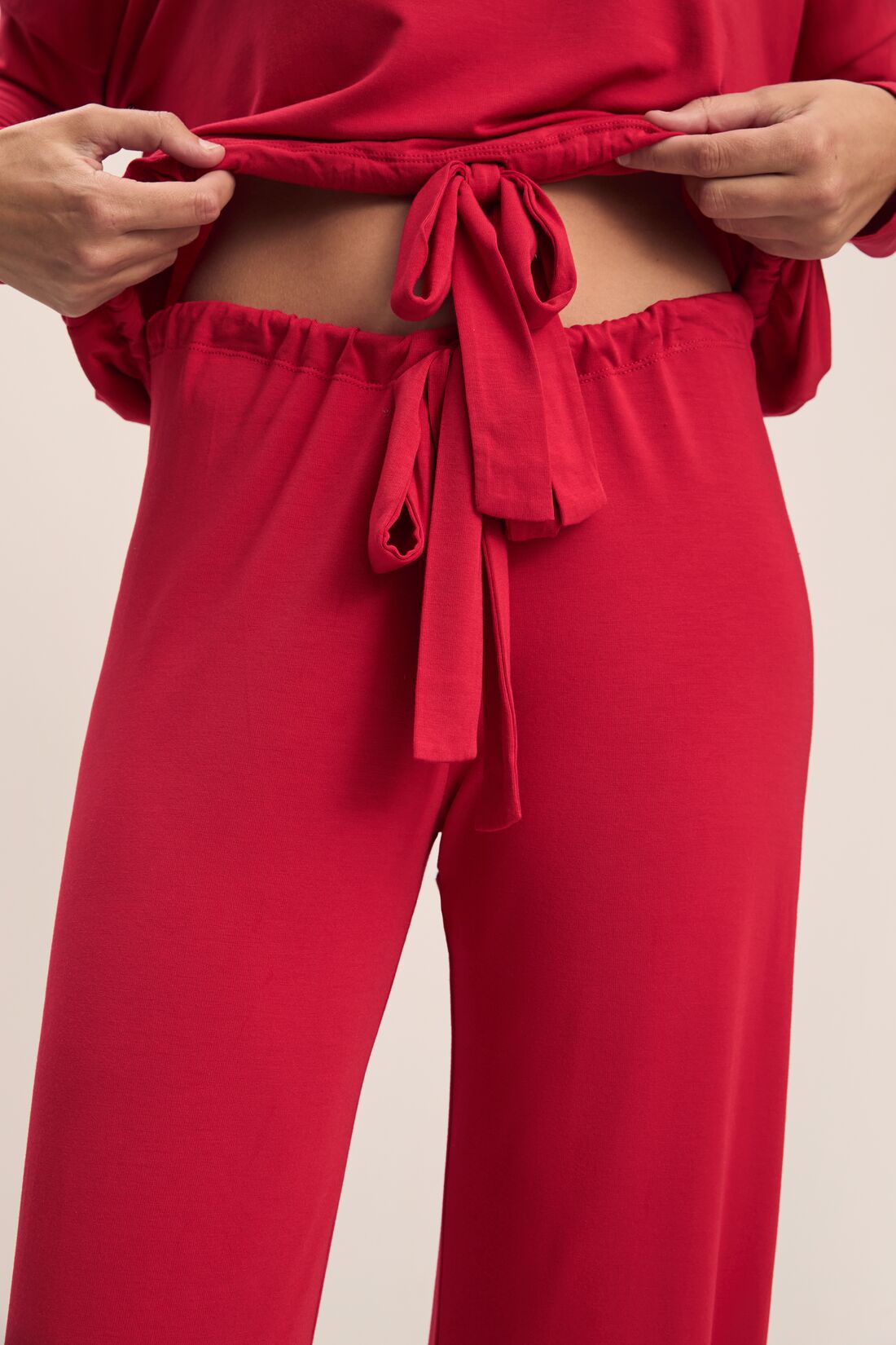 Model wears Gisele TENCEL™ Modal Slouchy PJ Set in Haute Red/Haute Red.