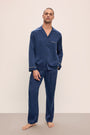 Model wears Charles Washable Silk Long PJ Set in Navy/Champagne.