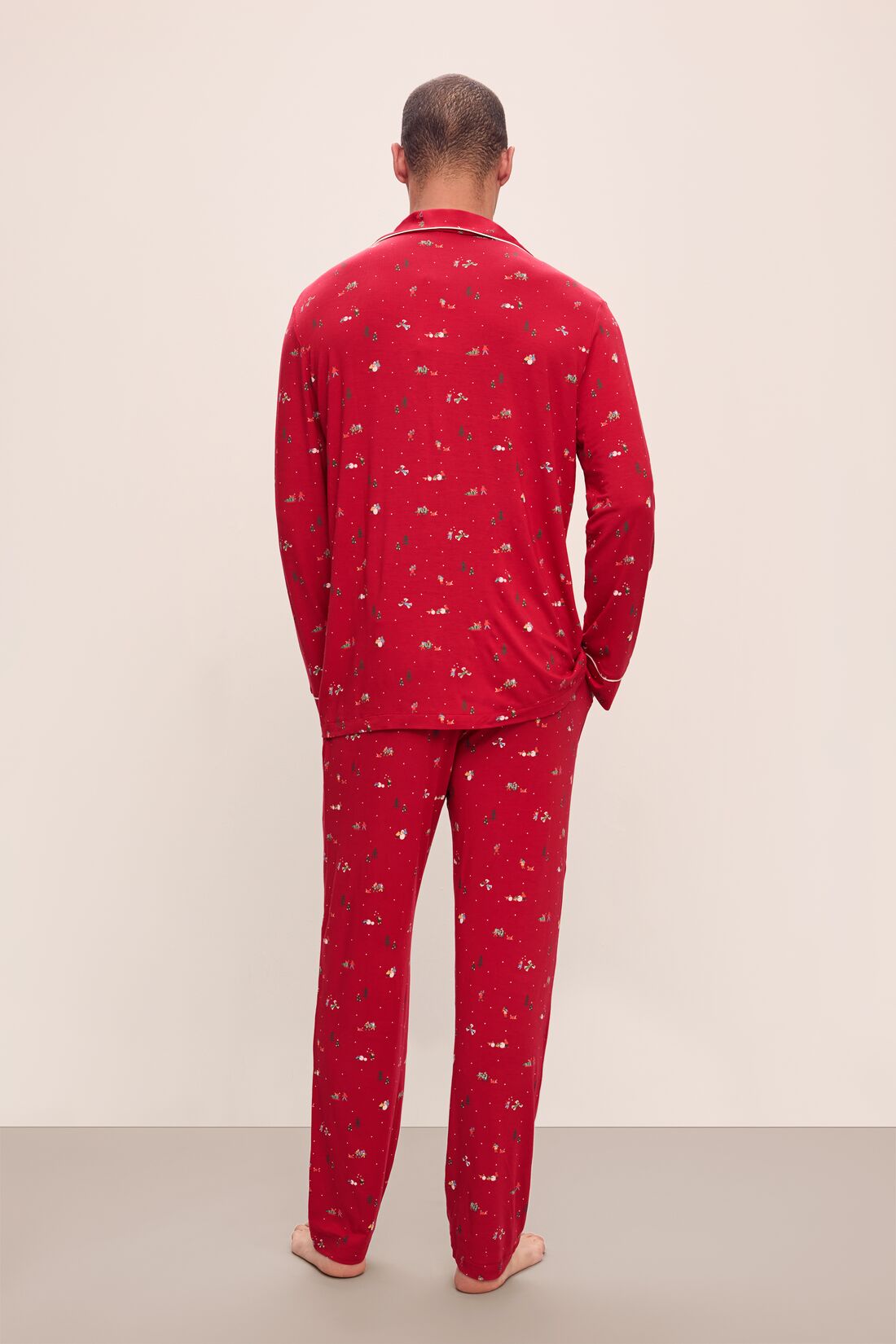 Model wears William Printed TENCEL™ Modal Long PJ Set in Winter Wonderland Haute Red/Ivory.