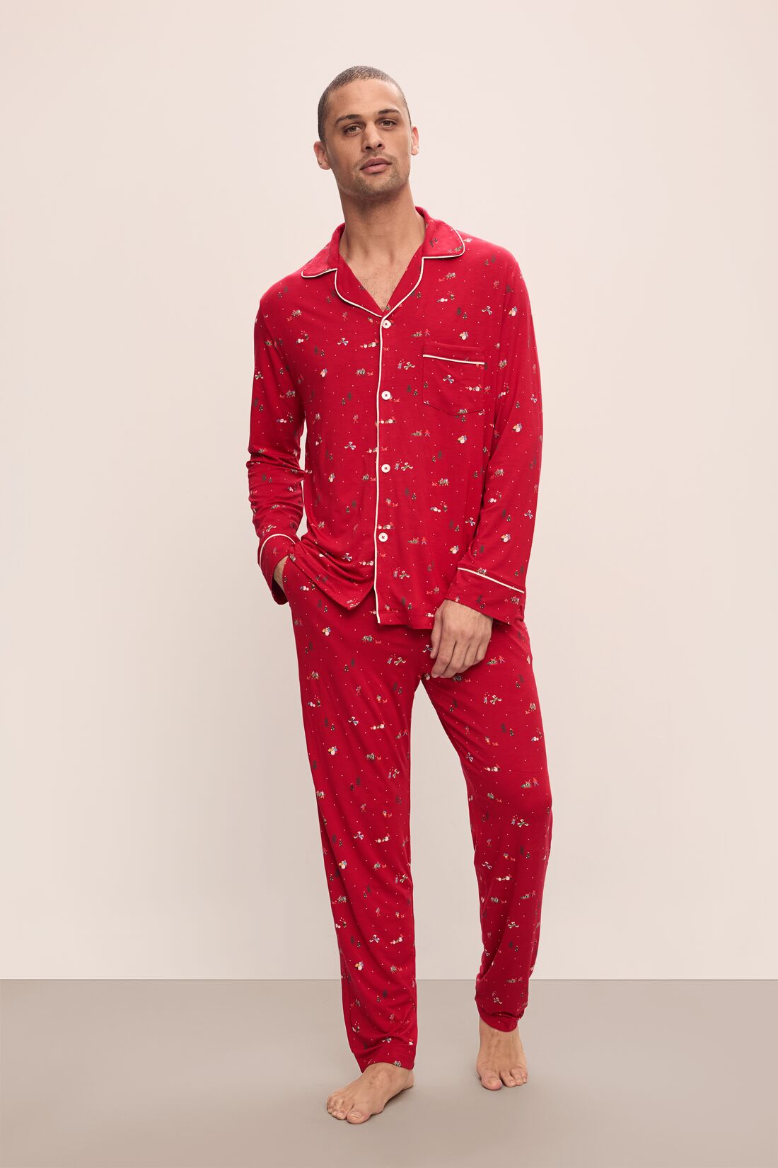 Model wears William Printed TENCEL™ Modal Long PJ Set in Winter Wonderland Haute Red/Ivory.