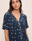 Model wears Gisele Printed TENCEL™ Modal Relaxed Short PJ Set in Woodland Pine Navy/Ivory.