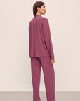 Model wears Gisele TENCEL™ Modal Long PJ Set in Raspberry/Ivory.