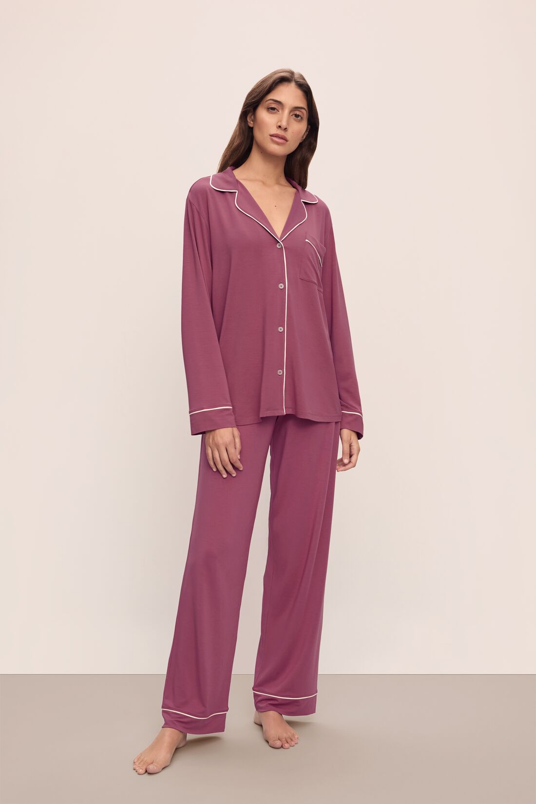 Model wears Gisele TENCEL™ Modal Long PJ Set in Raspberry/Ivory.