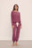 Model wears Gisele TENCEL™ Modal Slouchy PJ Set in Raspberry/Ivory.