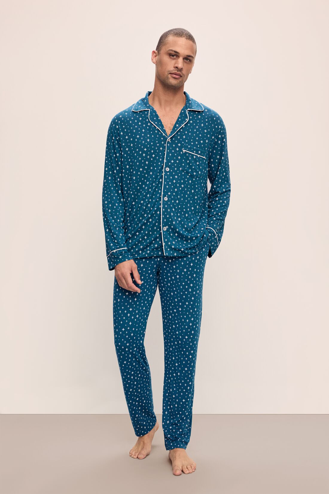 Model wears William Printed TENCEL™ Modal Long PJ Set in Festive Lights Sapphire/Ivory.