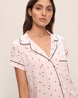 Model is wearing Gisele Printed TENCEL™ Modal Shortie Short PJ Set in Little Heart Sorbet Pink/Black