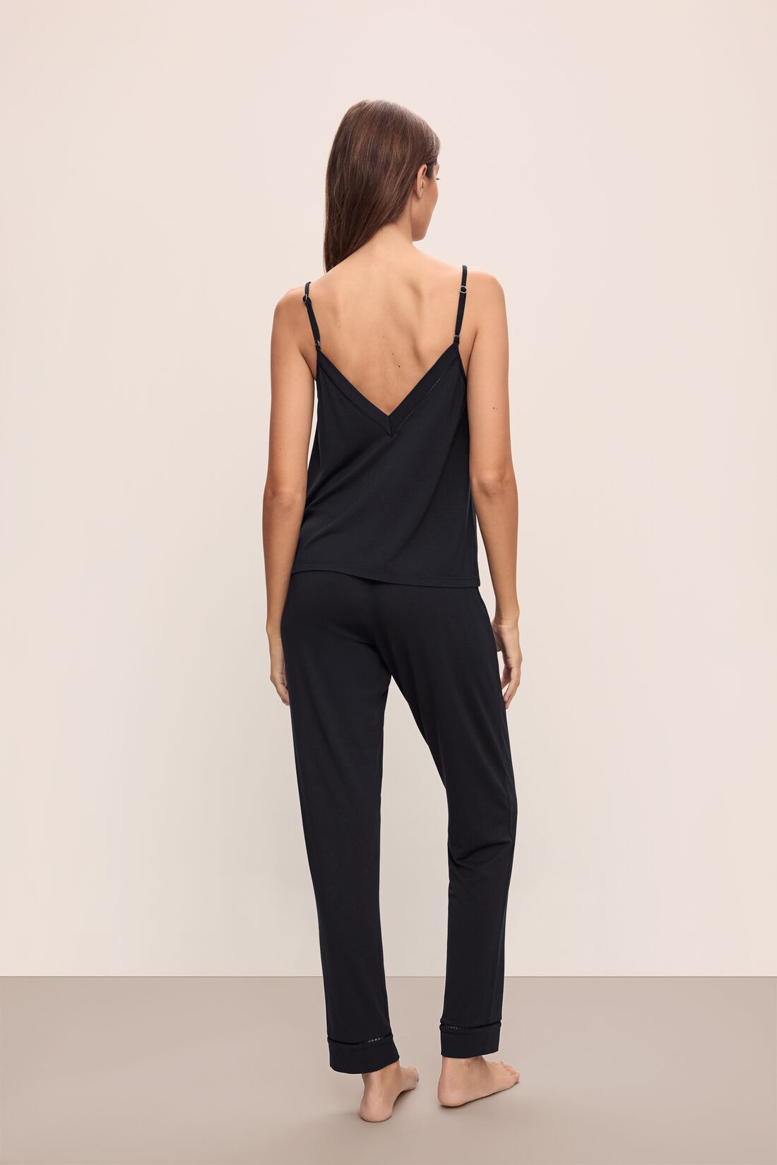 Back shot of Model wearing Fiona TENCEL™ Modal Cami & Pant PJ Set in black.