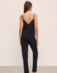 Back shot of Model wearing Fiona TENCEL™ Modal Cami & Pant PJ Set in black.