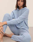 Model in Recycled Boucle Women's Hoodie and Jogger in Wedgewood.