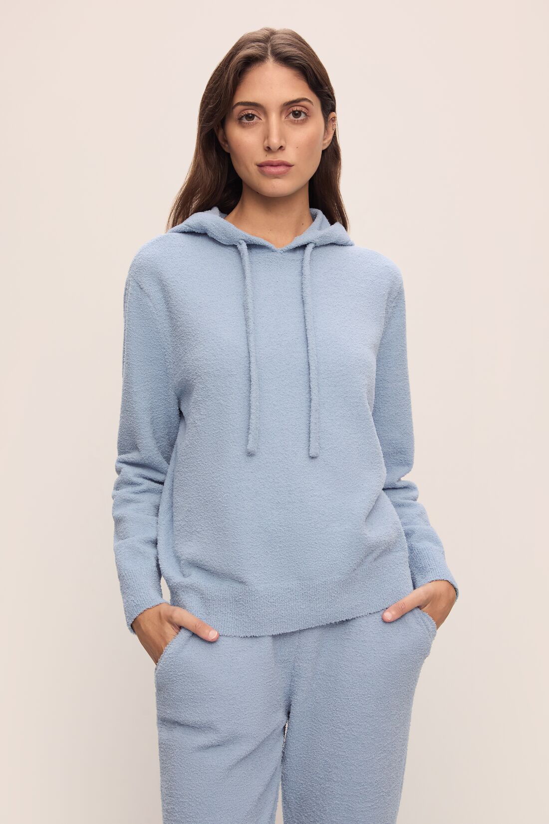 Model in Recycled Boucle Women's Hoodie and Jogger in Wedgewood.