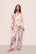 Model is wearing Inez Washable Silk Printed Long PJ Set in Ikebana Pearl/Dusty Rose.