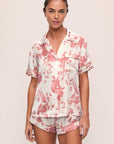 Model is wearing Inez Washable Silk Printed Short PJ Set in Ikebana Pearl/Dusty Rose.