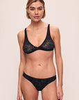 Model is wearing Soft Stretch Recycled Lace Brief in Black