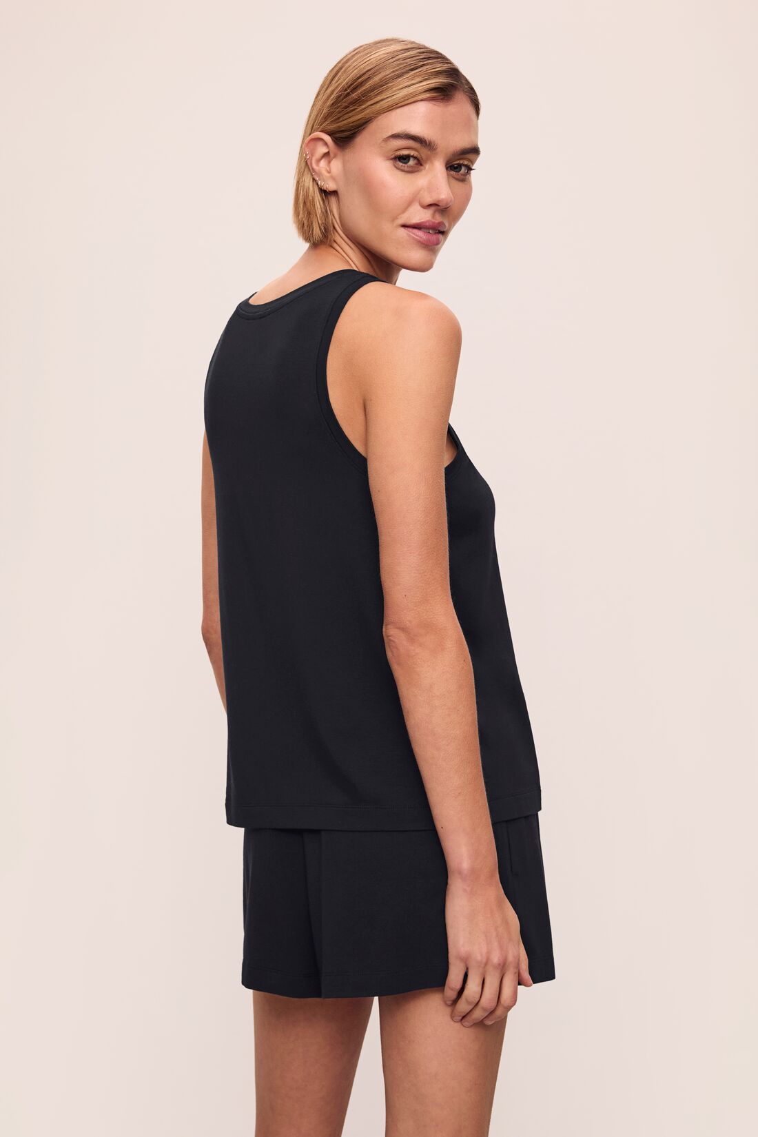 Model wears Gisele TENCEL™ Modal Everyday Tank in black.