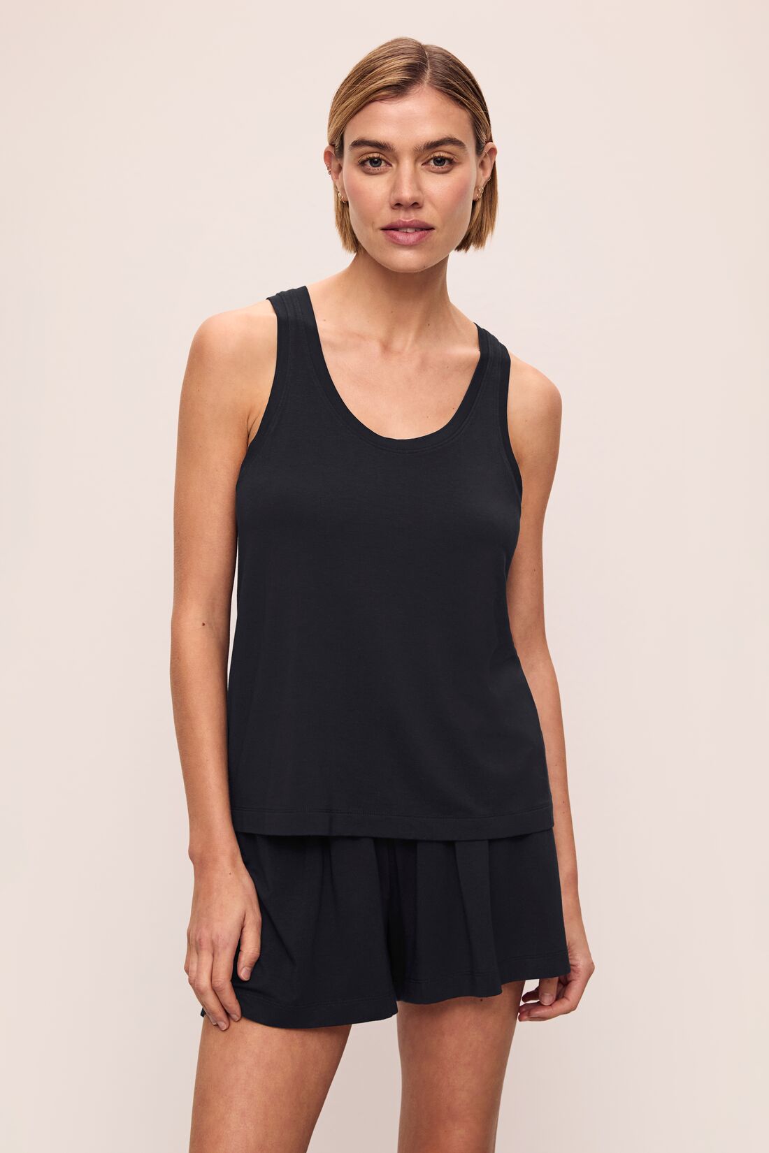 Model wears Gisele TENCEL™ Modal Everyday Tank in black.