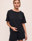 Model wears Gisele TENCEL™ Modal Everyday T-Shirt in black.