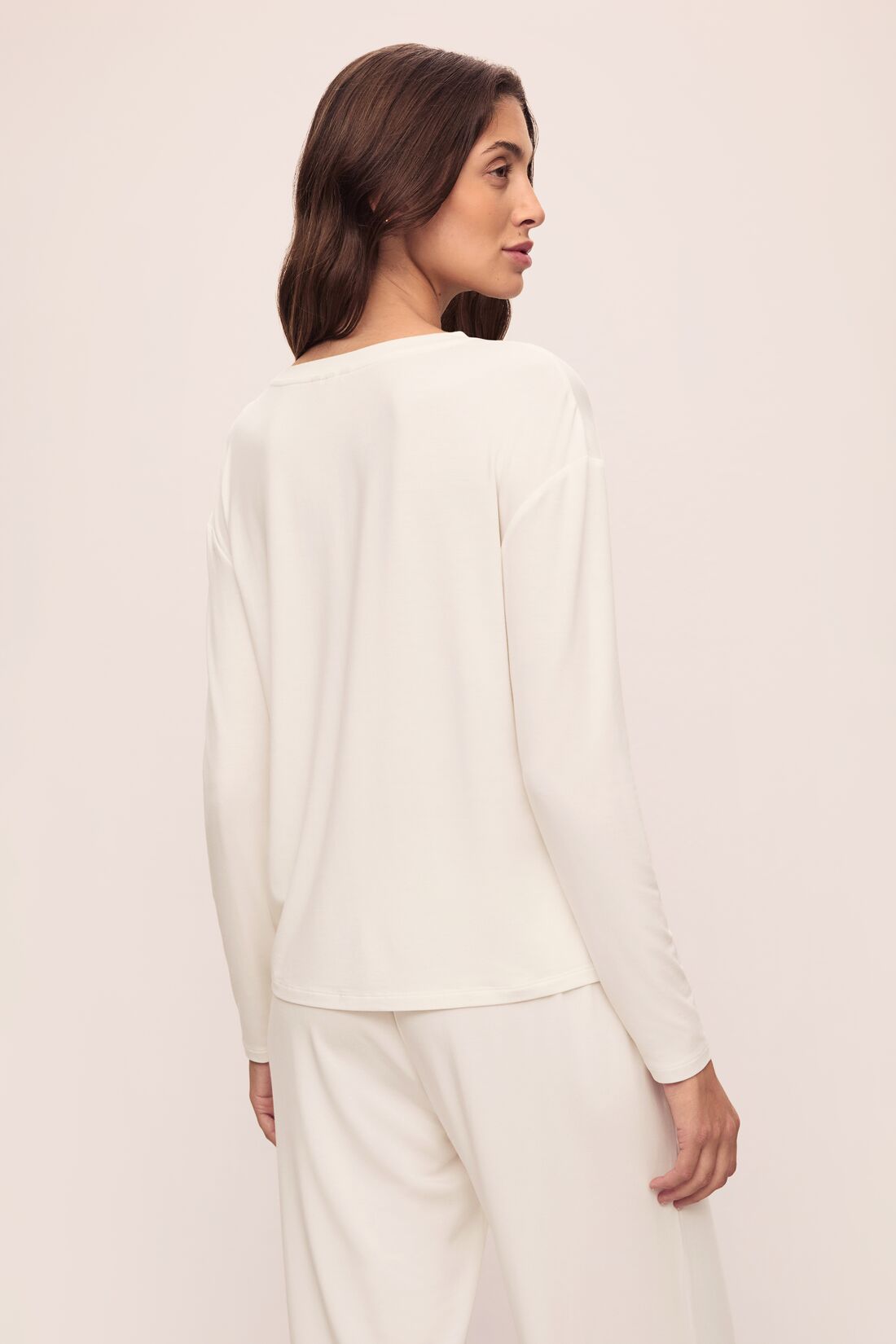 Model is wearing Gisele Tencel™ Modal Long Sleeve in Ivory