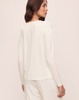 Model is wearing Gisele Tencel™ Modal Long Sleeve in Ivory