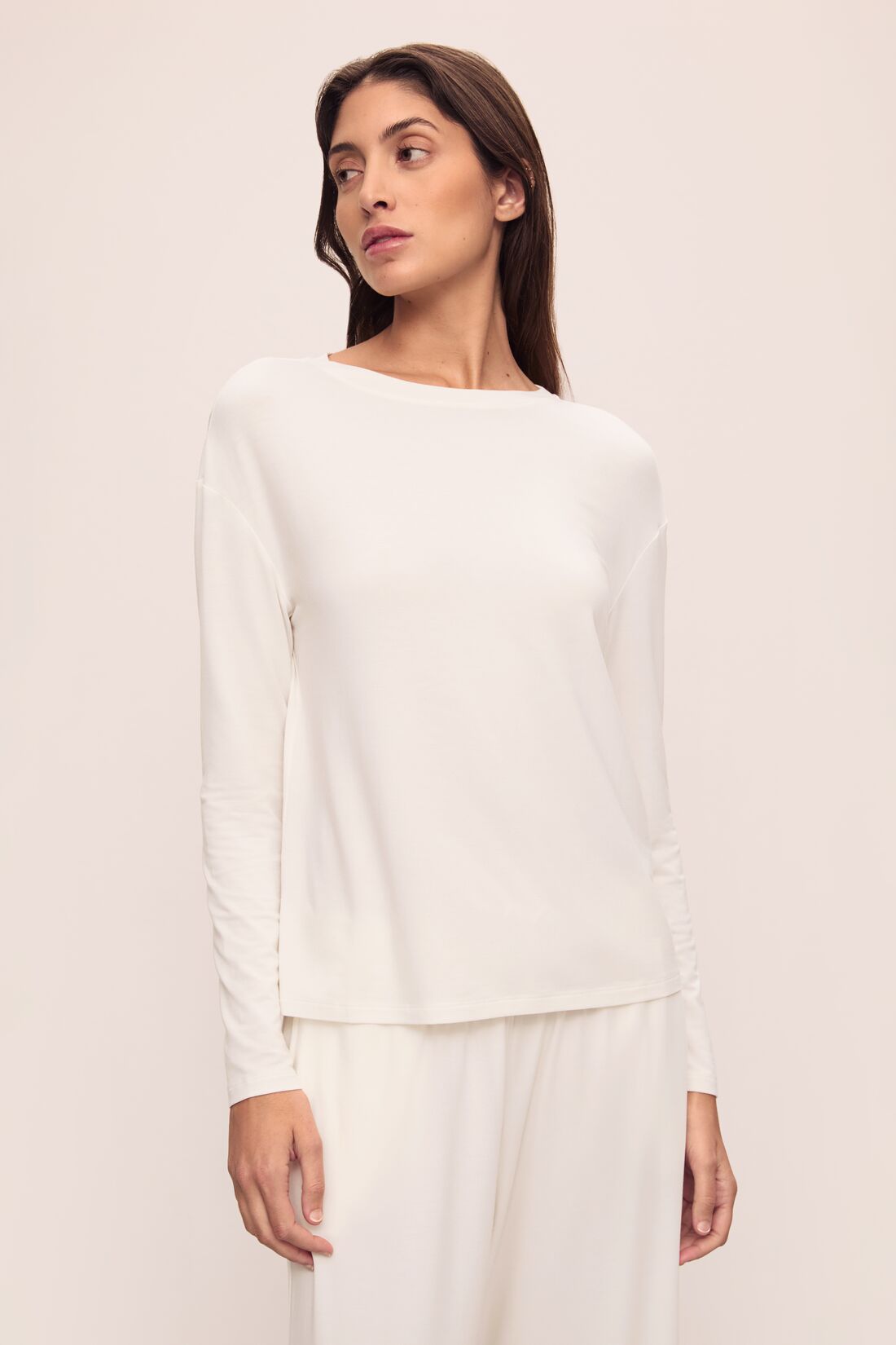 Model is wearing Gisele Tencel™ Modal Long Sleeve in Ivory