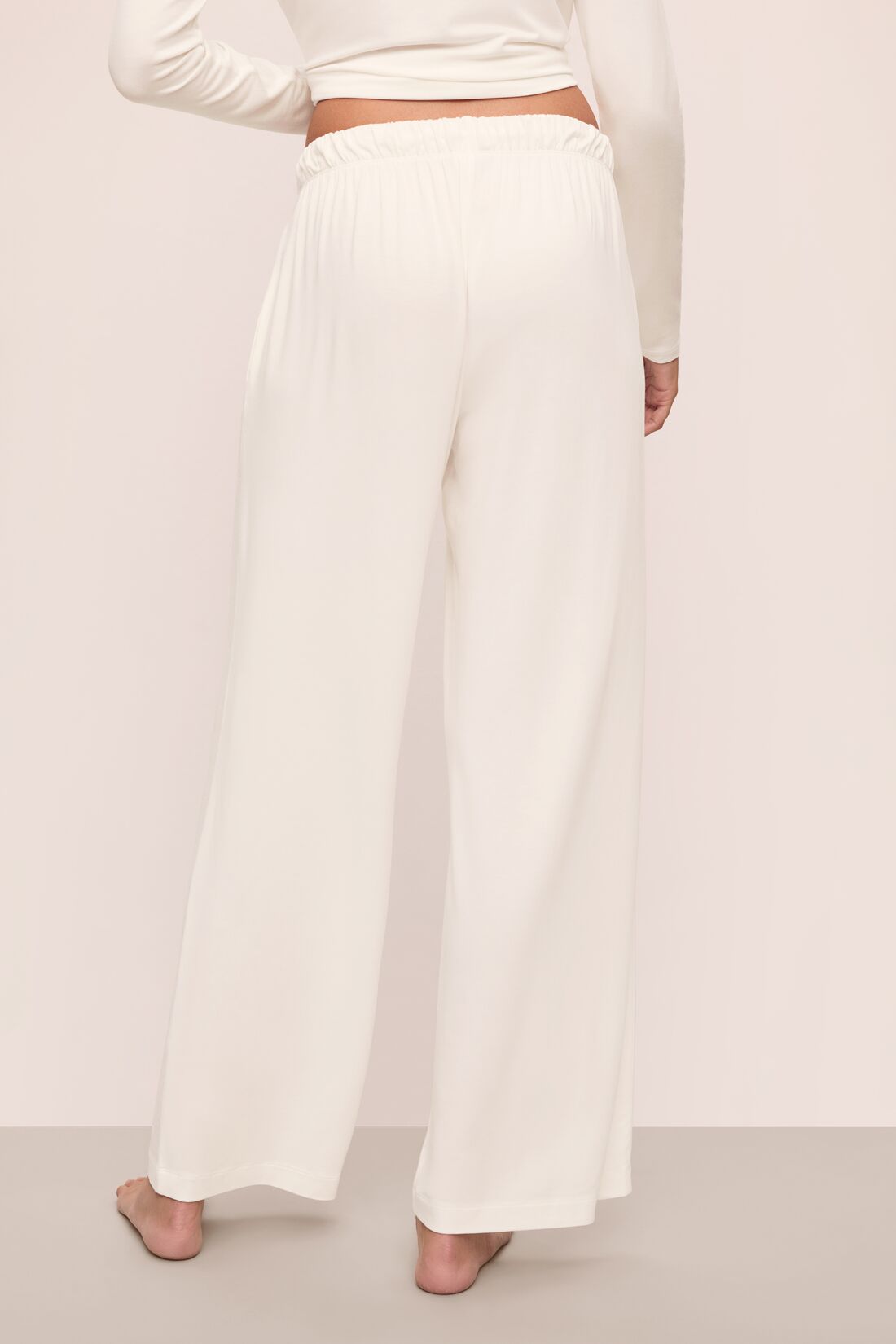 Model is wearing Gisele Tencel™ Modal Everyday Straight Leg Pant in Ivory
