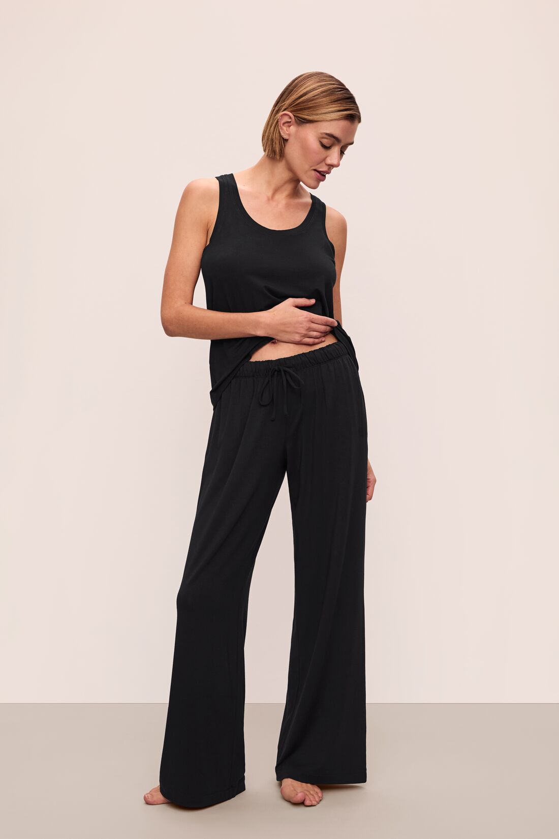 Model is wearing Gisele Tencel™ Modal Everyday Straight Leg Pant in Black