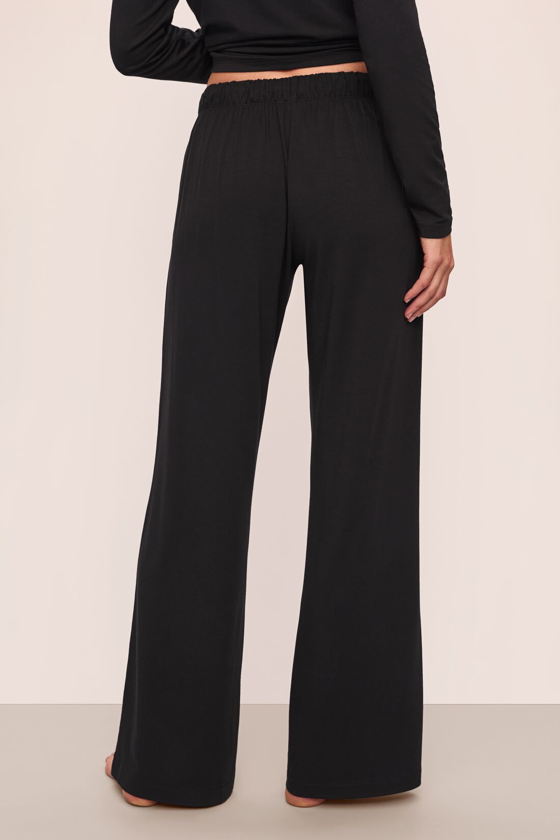 Model is wearing Gisele Tencel™ Modal Everyday Straight Leg Pant in Black