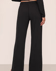 Model is wearing Gisele Tencel™ Modal Everyday Straight Leg Pant in Black