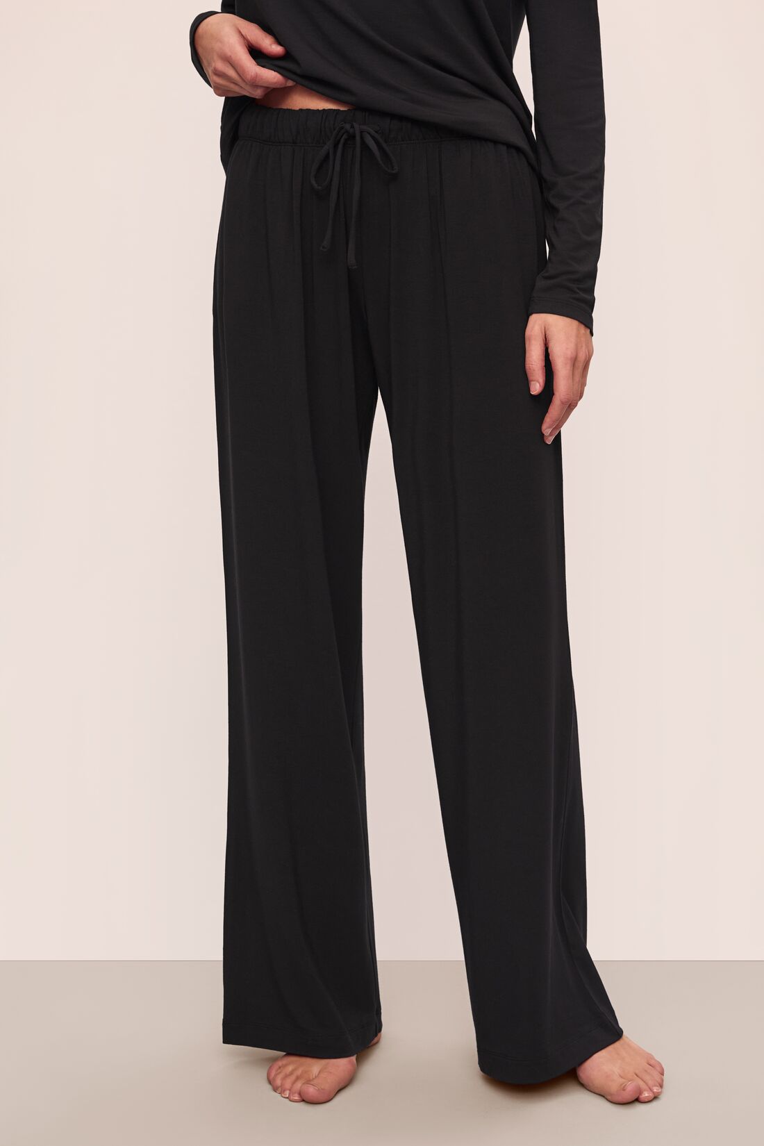 Model is wearing Gisele Tencel™ Modal Everyday Straight Leg Pant in Black