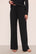 Model is wearing Gisele Tencel™ Modal Everyday Straight Leg Pant in Black