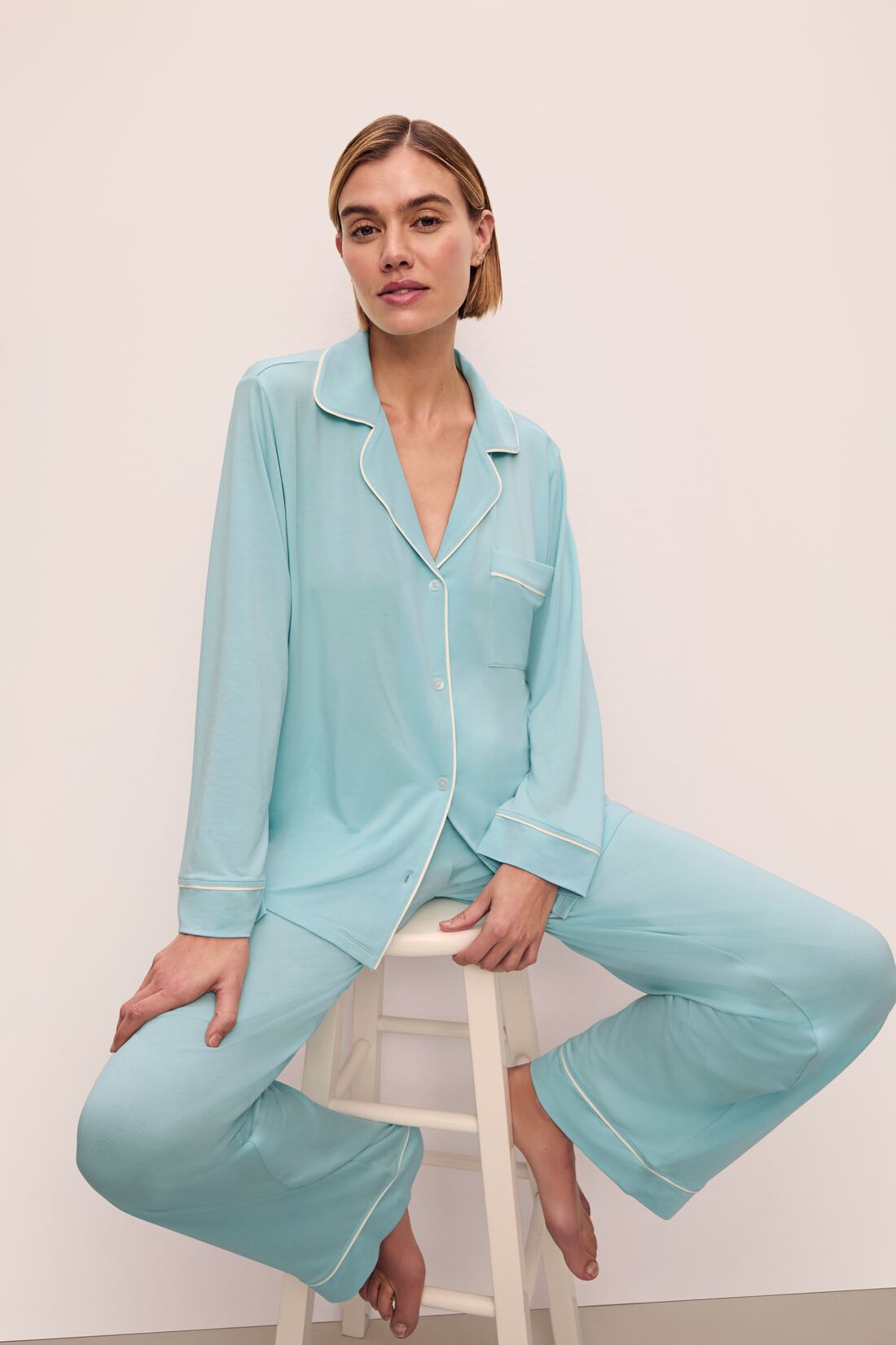 Model is wearing Gisele Tencel™ Modal Long Pj Set in Canal Blue/Ivory