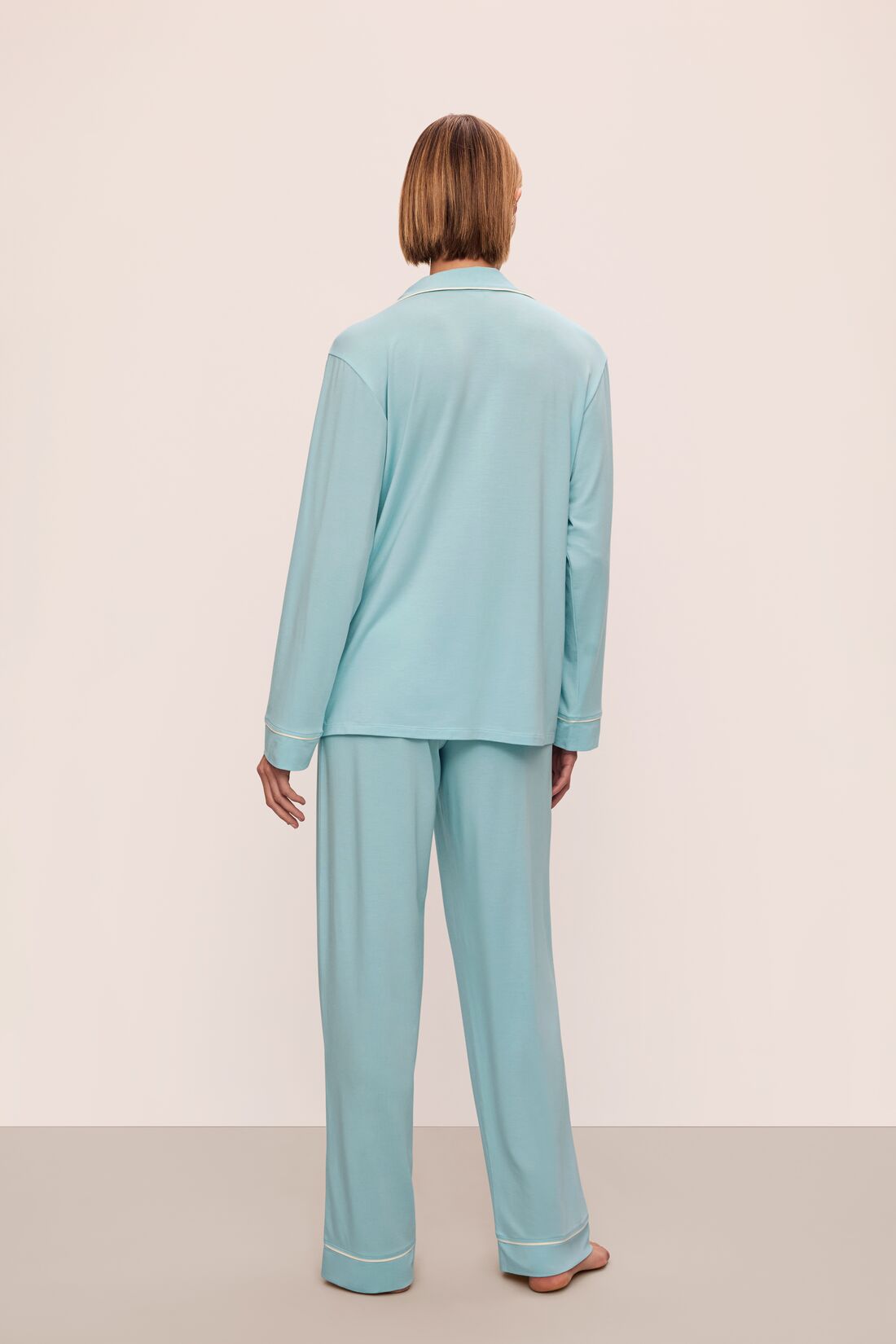 Model is wearing Gisele Tencel™ Modal Long Pj Set in Canal Blue/Ivory