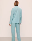 Model is wearing Gisele Tencel™ Modal Long Pj Set in Canal Blue/Ivory