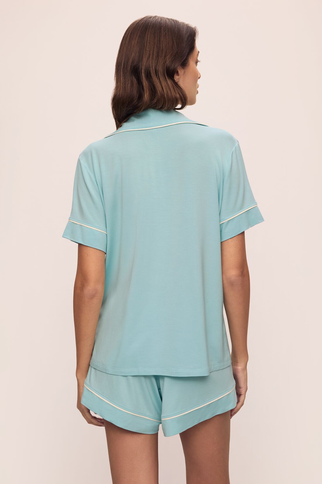 Model is wearing Gisele Tencel™ Modal Relaxed Short Pj Set in Canal Blue/Ivory