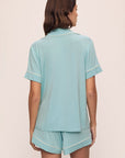 Model is wearing Gisele Tencel™ Modal Relaxed Short Pj Set in Canal Blue/Ivory