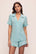 Model is wearing Gisele Tencel™ Modal Relaxed Short Pj Set in Canal Blue/Ivory