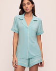 Model is wearing Gisele Tencel™ Modal Relaxed Short Pj Set in Canal Blue/Ivory