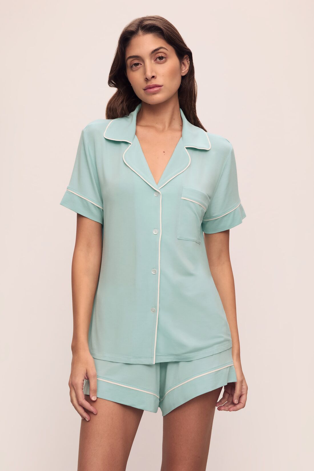 Model is wearing Gisele TENCEL™ Modal Relaxed Short PJ Set in Canal Blue/Ivory