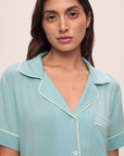 Model is wearing Gisele Tencel™ Modal Relaxed Short Pj Set in Canal Blue/Ivory