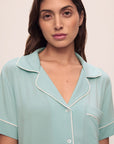 Model is wearing Gisele TENCEL™ Modal Relaxed Short PJ Set in Canal Blue/Ivory