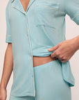 Model is wearing Gisele Tencel™ Modal Short Sleeve & Pant Pj Set in Canal Blue/Ivory