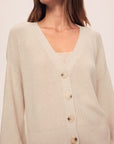 Model is wearing Fine Gauge Sweater Cardigan in Almond Heather